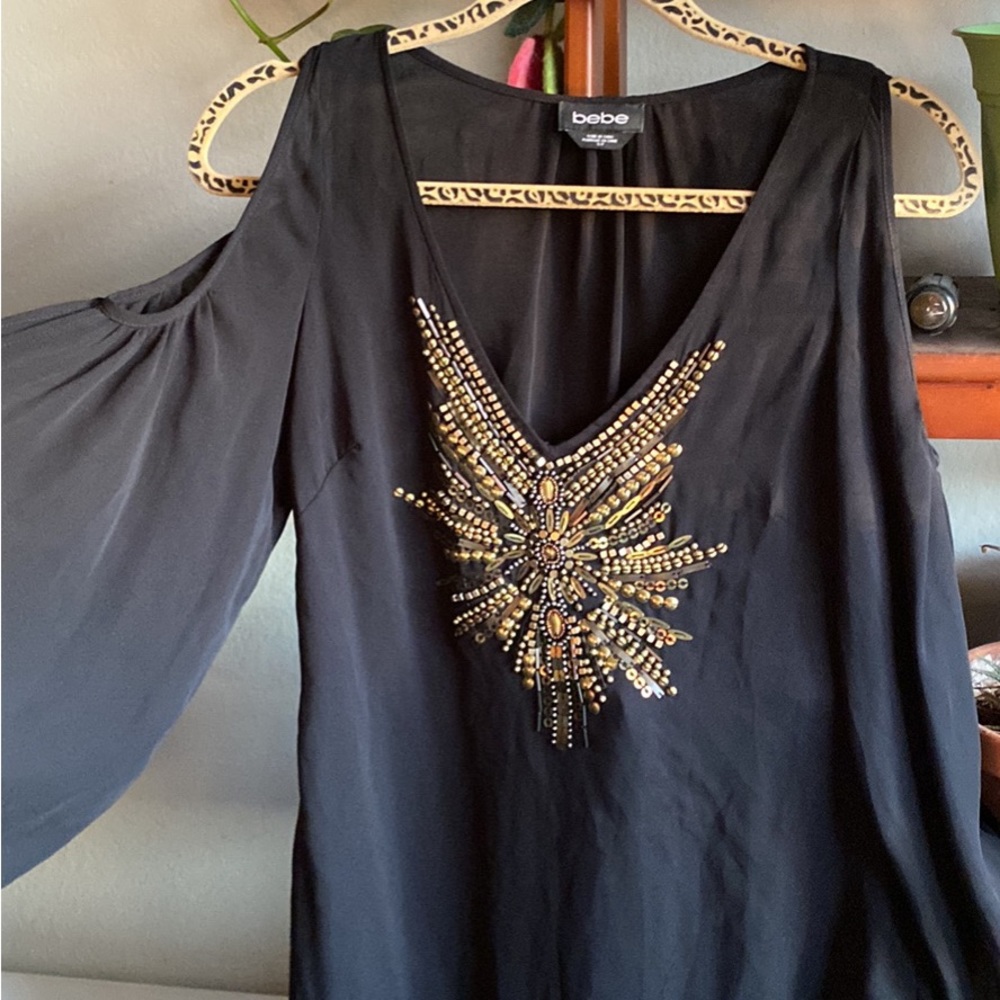 Bebe brand embellished top. Brand new.